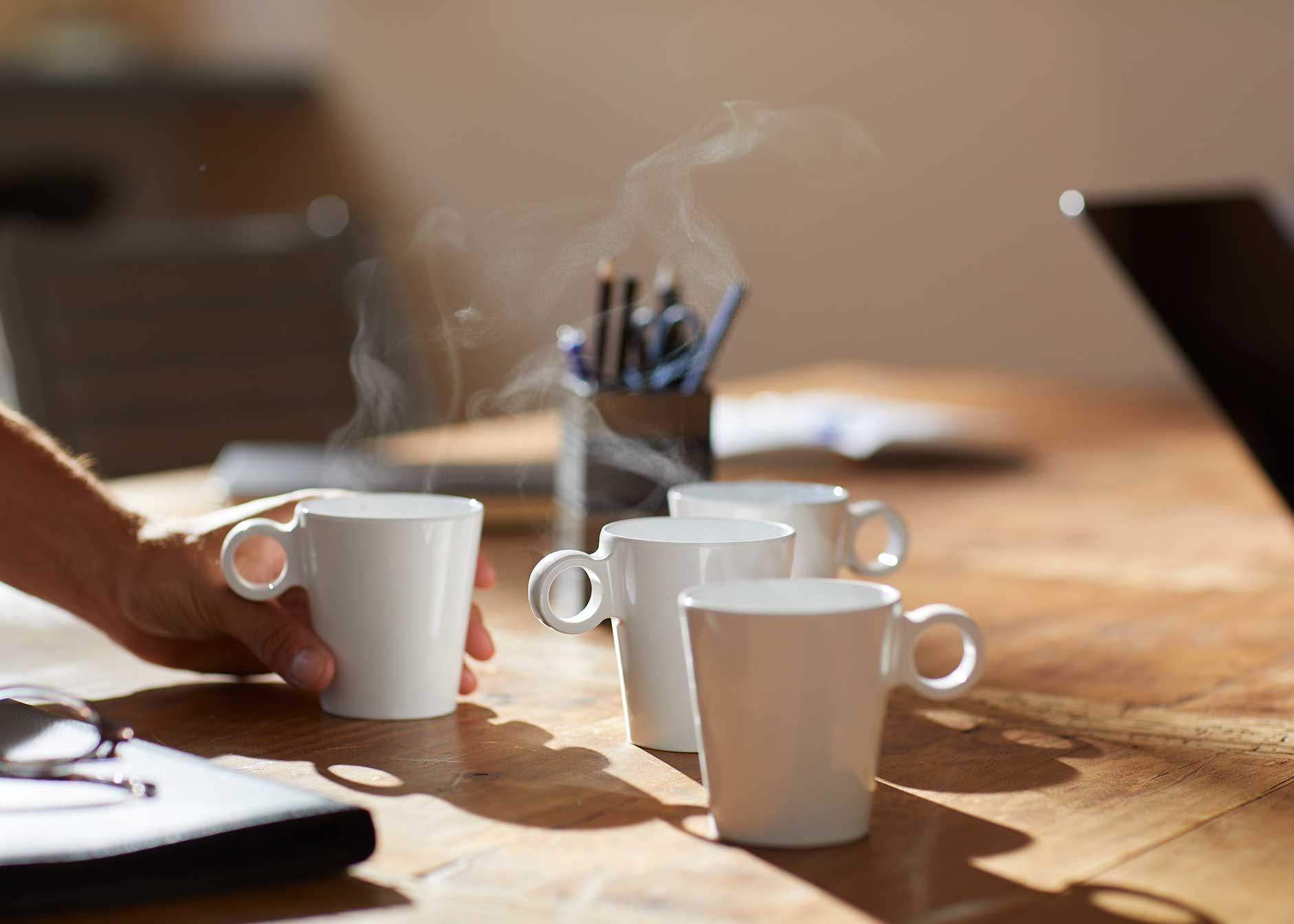 ES coffee cups on table